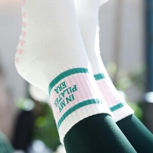In my Pilates retro pink and green cream non slip grip sock with heart grips for Pilates, barre, yoga or lagree image 3