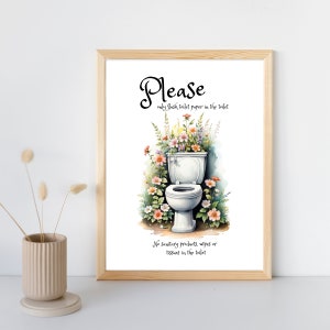 Könnte beinhalten: Ein gerahmter Druck mit einer Aquarellillustration einer weißen Toilette, die von bunten Blumen umgeben ist. Der Text lautet oben "Please, only flush toilet paper in the toilet" und unten "No sanitary products, wipes or tissues in the toilet".