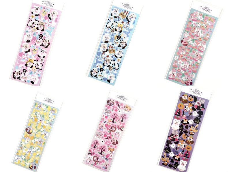 May include: Six sticker sheets with various designs. Each sheet is rectangular and packaged in clear plastic. The designs include cartoon animals, flowers, and fruits in pastel colors. The top of each sheet has a white header with text.