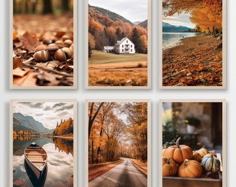 May include: Set of six framed art prints featuring autumnal scenes. Images include close-ups of acorns, a white house in a field, a lake with a canoe, a road through a forest, and pumpkins in a wooden crate. The color palette is dominated by warm oranges and browns.