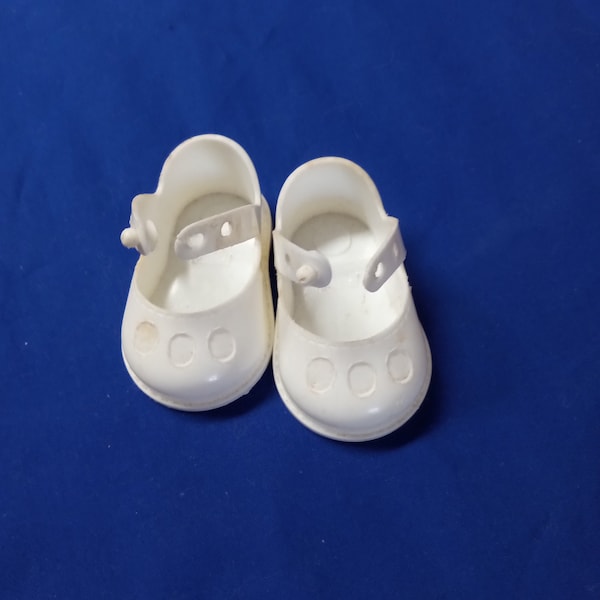 White Vintage Plastic Shoes 2-1/2"