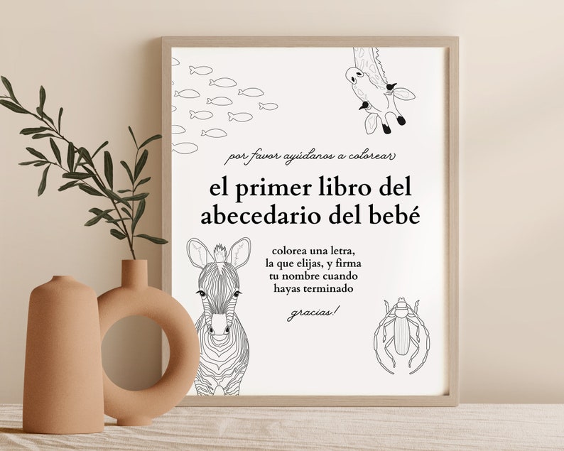 May include: Black and white printable coloring page featuring a zebra, a giraffe, a beetle, and fish. The text reads "por favor ay&uacute;danos a colorear el primer libro del abecedario del beb&eacute; colorea una letra, la que elijas, y firma tu nombre cuando hayas terminado gracias!"