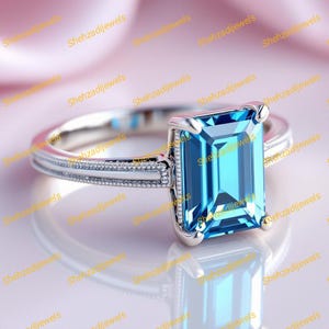 Sterling Silver Emerald Cut Blue Topaz Ring – December Birthstone