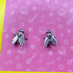 Fly stud earrings