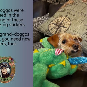 May include: A small, tan dog peeks out from behind a green plush toy with yellow accents. The dog is near a pillow with a map design. Text on the image reads, "No doggos were harmed in the making of these amazing stickers."