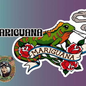 May include: A sticker featuring a green and orange iguana smoking a cigarette, with the word "MARIGUANA" above and on a banner. Red roses and green leaves surround the iguana. A "Buckle Up Betsy" logo is in the lower left corner.