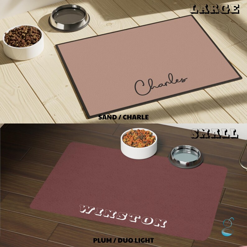 May include: Two pet food mats, one sand-colored and one plum-colored, each with a black border. The sand mat has the name "Charles" in script, and the plum mat has "Winston" in block letters. Both mats are next to pet bowls.