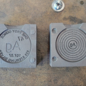 Moneda de plata esterlina de 1 oz con molde de grafito