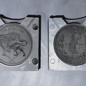 Molde de grafito para monedas continentales