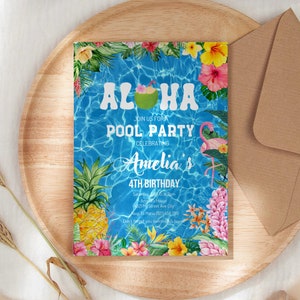 May include: Aloha Pool Party invitation with a tropical design featuring a pineapple, flowers, and a flamingo. The invitation is on a wooden background with a brown envelope.