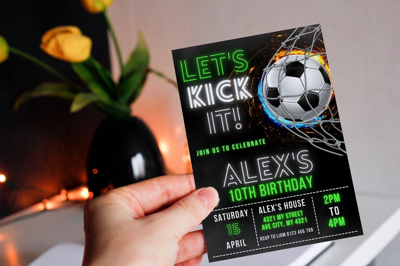 May include: Black and green birthday invitation with neon green text that reads "Let's Kick It!" and "Alex's 10th Birthday". The invitation features a soccer ball in a net with flames behind it. The invitation includes the date, time, and location of the party.