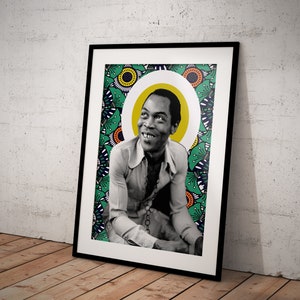 May include: A black and white portrait of a man with a yellow halo, set against a green and black patterned background. The man is smiling and wearing a white shirt with a beaded necklace.