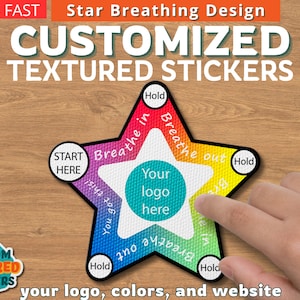 May include: Customized textured sticker in a star shape with a breathing exercise design. The sticker features a central area for a logo, surrounded by text prompts in a rainbow gradient. The text includes "Start Here", "Breathe in", "Breathe out", and "Hold".