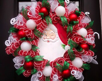 Santa Claus deco mesh wreath with a retro vintage Christmas vibe in red, green and white