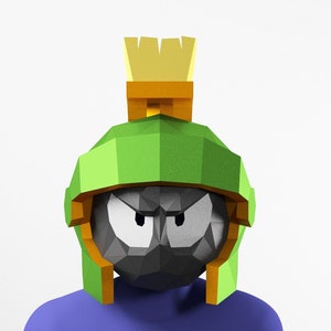 May include: A cartoon character wearing a green and gold helmet with a black face. The helmet has a yellow and orange plume on top.