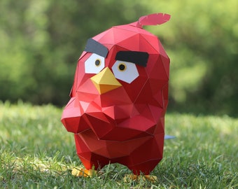 Red Bird Template for creating a polygonal paper craft sculpture with beautiful evil eyebrows in a cartoon style