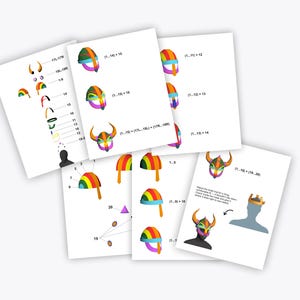 May include: Several white sheets of paper with illustrations of a Viking helmet in various stages of assembly. The helmets are shown in different colors, including rainbow, and feature horns. Text and numbers are also present.