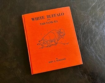 Het boek White Buffalo uit 1941 van John D. Nicholson, met gedetailleerde illustraties.
