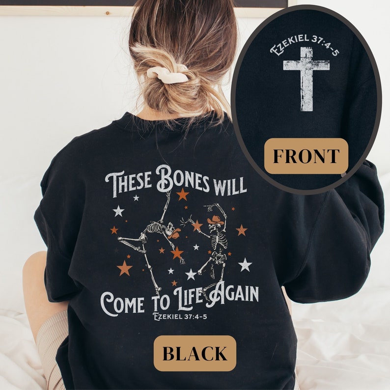 May include: Black sweatshirt with a graphic of two skeletons dancing with stars and the text "These bones will come to life again Ezekiel 37:4-5".