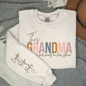 I Wear My Heart on my Sleeve Grandmother Sweatshirt Custom Grandmother Sweatshirt with Children Name on Sleeve Personalized Gift for Grandma