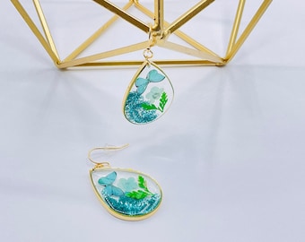 Hangoorbellen met blauwe harsbloem, verguld, glitter