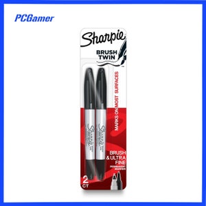 May include: A pack of two black Sharpie Brush Twin permanent markers. The markers have a brush tip and are designed for use on most surfaces. The packaging features the Sharpie logo and the text "Brush Twin" and "Marks on Most Surfaces".