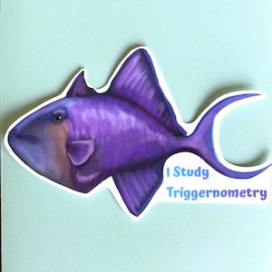 May include: Purple fish sticker with the text "I Study Trigonometry".