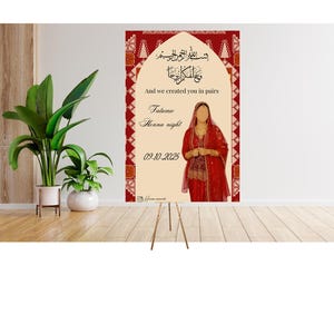May include: A decorative sign on an easel featuring calligraphy and the text "And we created you in pairs." The sign also includes the words "Fatume Henna night" and the date 09.10.2025. The sign has a red and cream color scheme and depicts a person in a red outfit.