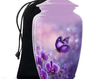 May include: A lavender cremation urn with a butterfly and orchid design. The urn has a glossy finish and a matching lid. A black drawstring bag is behind the urn.