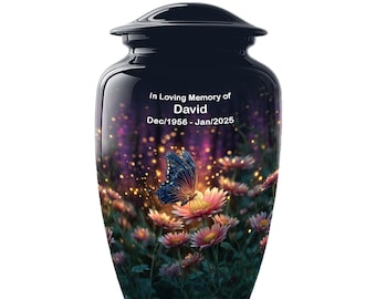 May include: A black cremation urn with a glossy finish. The urn features a colorful floral and butterfly design. The text "In Loving Memory of David Dec/1956 - Jan/2025" is displayed on the front.