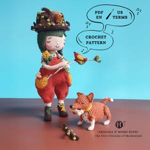 May include: A crocheted doll wearing a hat and overalls, holding a twig with a bird. A crocheted dog stands nearby. The image includes text that says "CROCHET PATTERN" and "US TERMS".