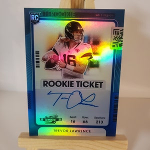 Trevor Lawrence 2021 Panini Prizm Contenders Optic Rookie Auto #101 Novelty NFL Football Reprint Card