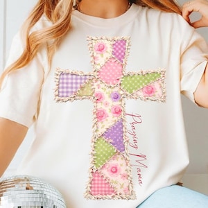 May include: A white ceramic mug with a black handle and the text "But First, Coffee" in a black, handwritten-style font. The mug is on a white surface.