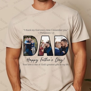 May include: Beige t-shirt with the word "DAD" in black, each letter filled with a family photo. The shirt also features the text "Happy Father's Day!" and a Bible verse. A personalized gift for Father's Day.