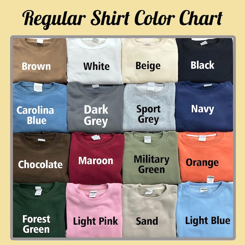May include: A Regular Shirt Color Chart displaying sixteen folded crewneck sweatshirts in various colors including brown, white, beige, black, carolina blue, dark grey, sport grey, navy, chocolate, maroon, military green, orange, forest green, light pink, sand, and light blue.