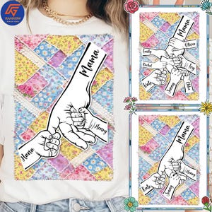 May include: White t-shirt featuring a graphic of a parent's hand holding a child's hand, with the words "Mama" and "Henry". The background is a patchwork design in various colors. Additional designs show hands with names.