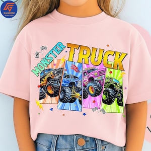 May include: A white ceramic mug with a black handle and the text "But First, Coffee" in a black, bold font. The mug is on a white surface.