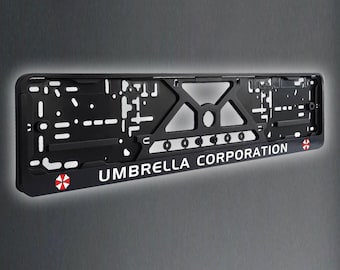 Umbrella Corporation Nummernschildrahmen Halter Weiß Rot Reflektierender Rahmen - Lustiger Kennzeichenrahmen - Perfektes Autozubehör!