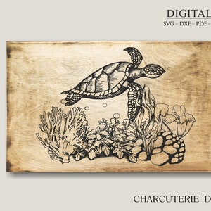 May include: A black and white line art illustration of a sea turtle swimming in the ocean. The turtle is surrounded by coral, seaweed, and other marine life. The image is on a wooden background.