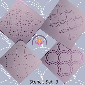 May include: Set of four quilting stencils featuring different geometric designs. The stencils are made from a light purple plastic and have a dashed line pattern. The stencils are labelled "Stencil Set 3".
