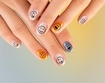 Smiley nail tattoos