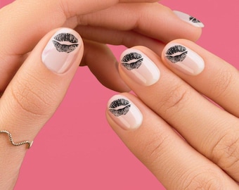 Kiss mouth nail tattoos