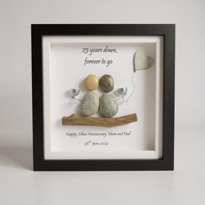 Silver Wedding Anniversary Gift for a family member or friend. Two pebble people with silver wine glasses and heart.