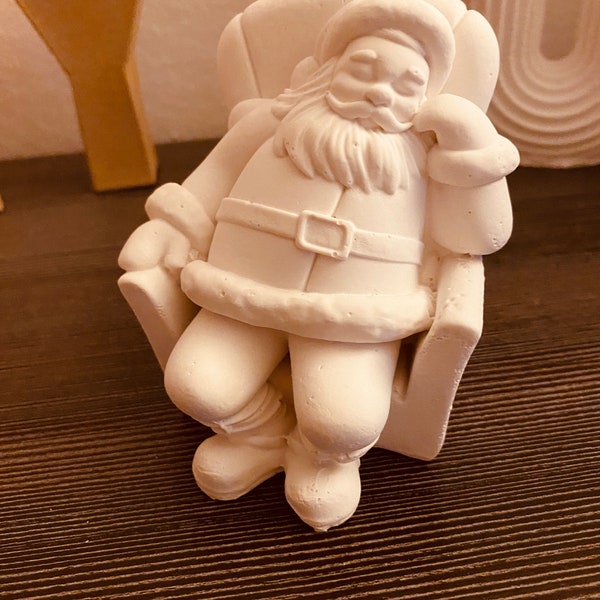 Weihnachtsmann im Sessel