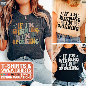 May include: Three t-shirts with the text "If I'm Winning I'm Spinning" in a retro font with slot machine symbols. The shirts are in dark grey heather, cream, and black.