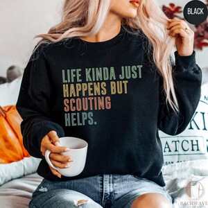 Life Kinda Just Happens But Scouting Helps shirt, Unique graphic sweatshirt, Trendy casual wear, Perfect gift for scouts