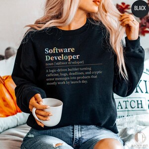 Black sweatshirt with "Software Developer" definition and humorous description.
