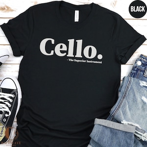 May include: Black t-shirt with white text that reads "Cello. - The Superior Instrument"