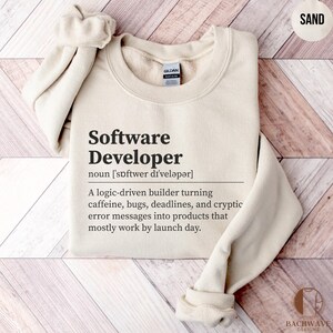 Cream sweatshirt with "Software Developer" definition and "Bachwave Designs" logo.