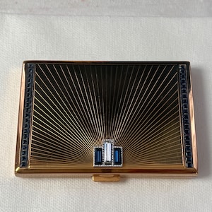 Elizabeth Arden Mid Century Modern Compact. Cristalli Art Déco e design a forma di stella. Chic in stile "Mad Men"! Disponibile servizio di riempimento personalizzato.